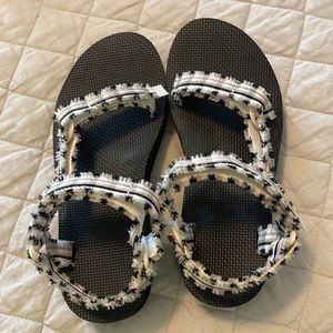 Ladies TEVA sandals, black/white plaid, rarely worn and like new condition.
